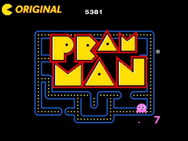 Classic Pac-Man arcade cabinet in a dimly lit arcade setting
