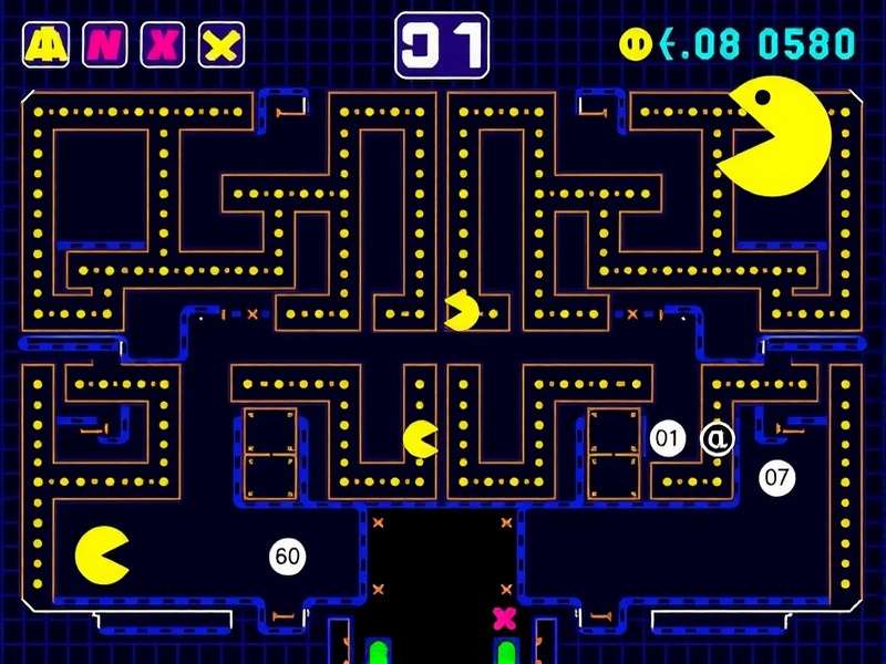 Classic Pac-Man arcade cabinet in a dimly lit arcade